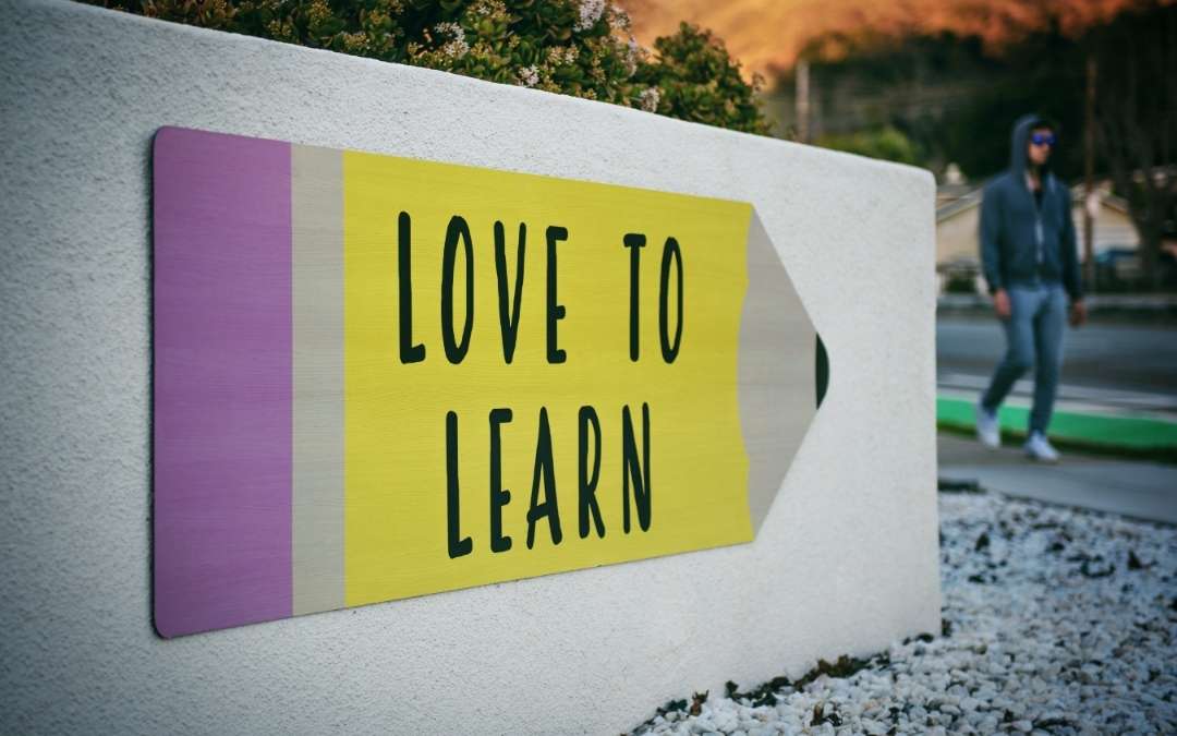 Schild mit Aufschrift Love to Learn